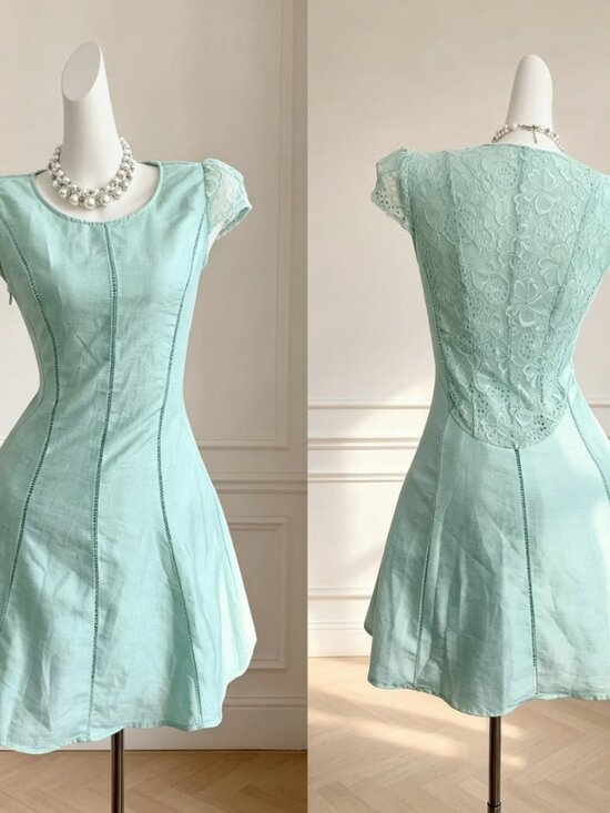 Dresses & Skirts - Vintage‑style mint green mini dress.